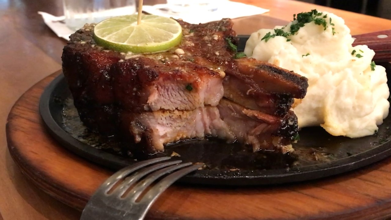 Thick cut pork chop at Perry's Steakhouse Coral Gables, Miami, Florida